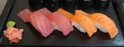 Nigirizushi is usually served in pairs. Shown above is a plate of tuna and salmon nigiri